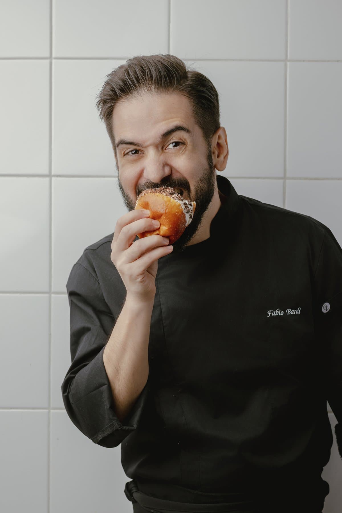 Chef Fabio Bardi tasting a maritozzo