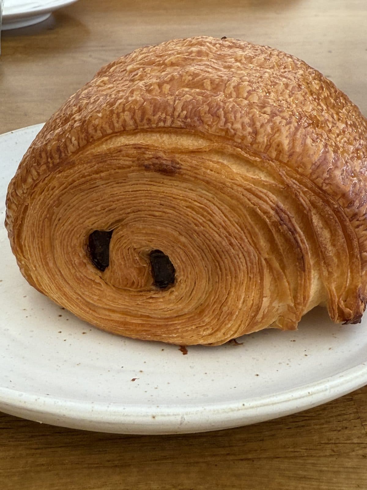 Cornetto al Cioccolato — Two batons of 70% Valrhona chocolate inside our signature laminated dough.