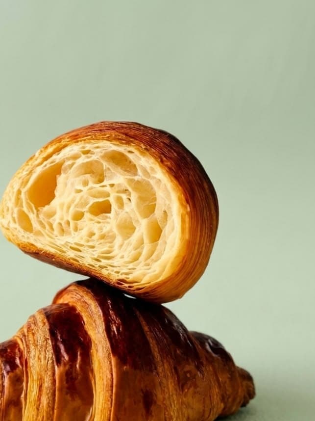 SD Cornetto — A buttery Italian cornetto baked for that soft, flaky pull-apart moment. Classic, elegant, and perfect just like you. Dangerously easy to justify with coffee.