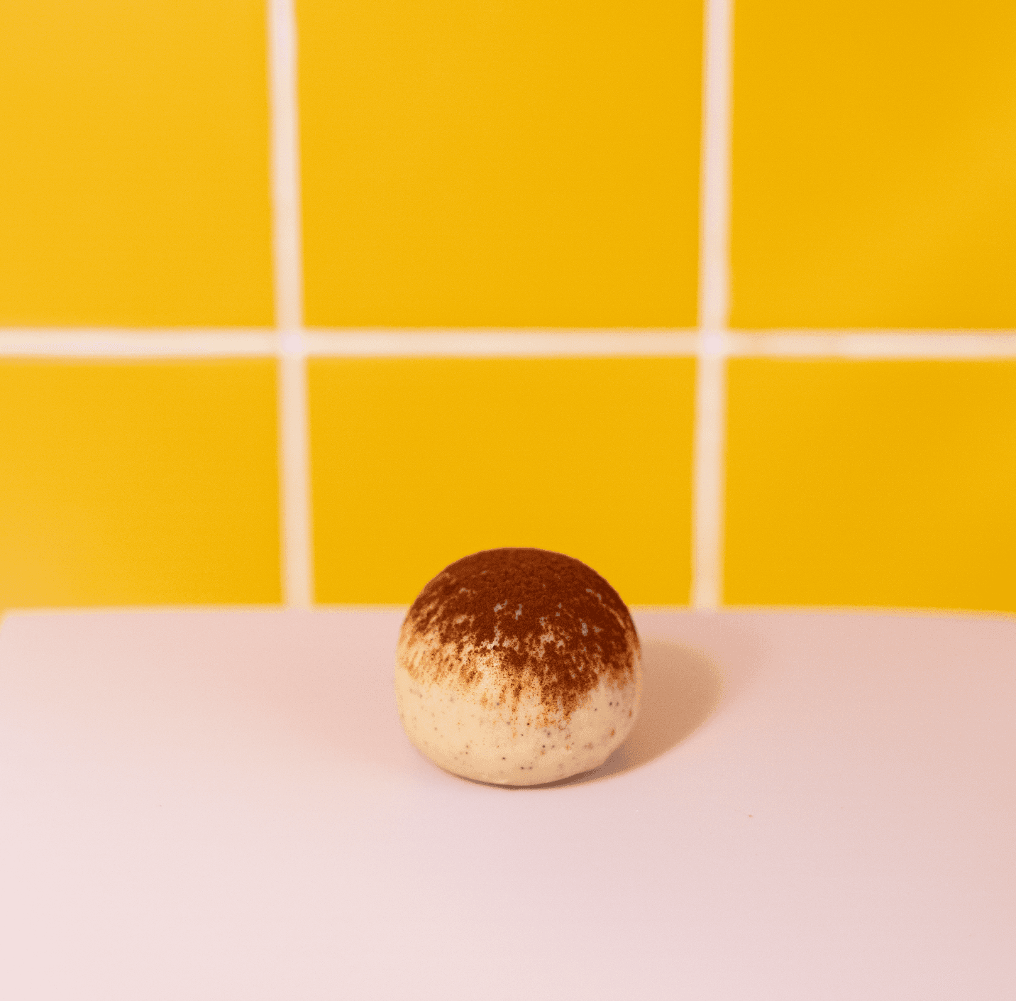 Tiramisu — A classic Italian tiramisu layered with espresso-soaked sponge, silky mascarpone cream, and a dusting of premium cocoa. Rich, light, and impossible to stop at one bite.